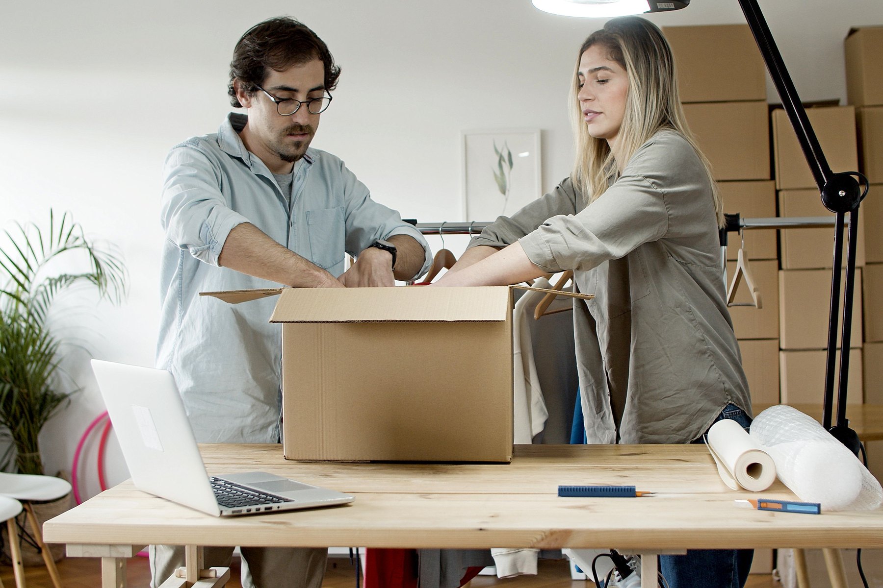 Small ecommerce team preparing customer orders and launch fulfillment