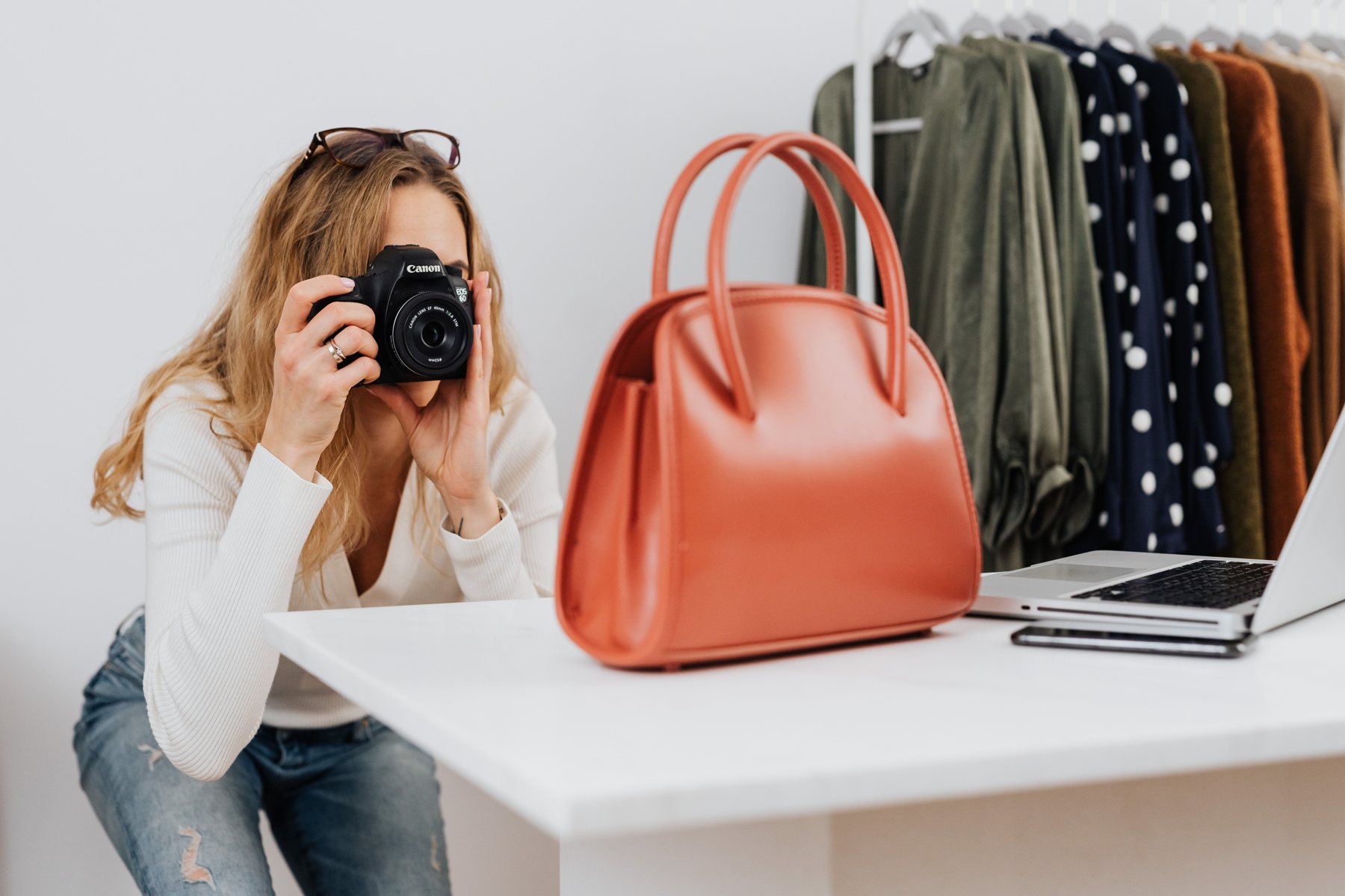 Product photographer creating ecommerce imagery for a handbag