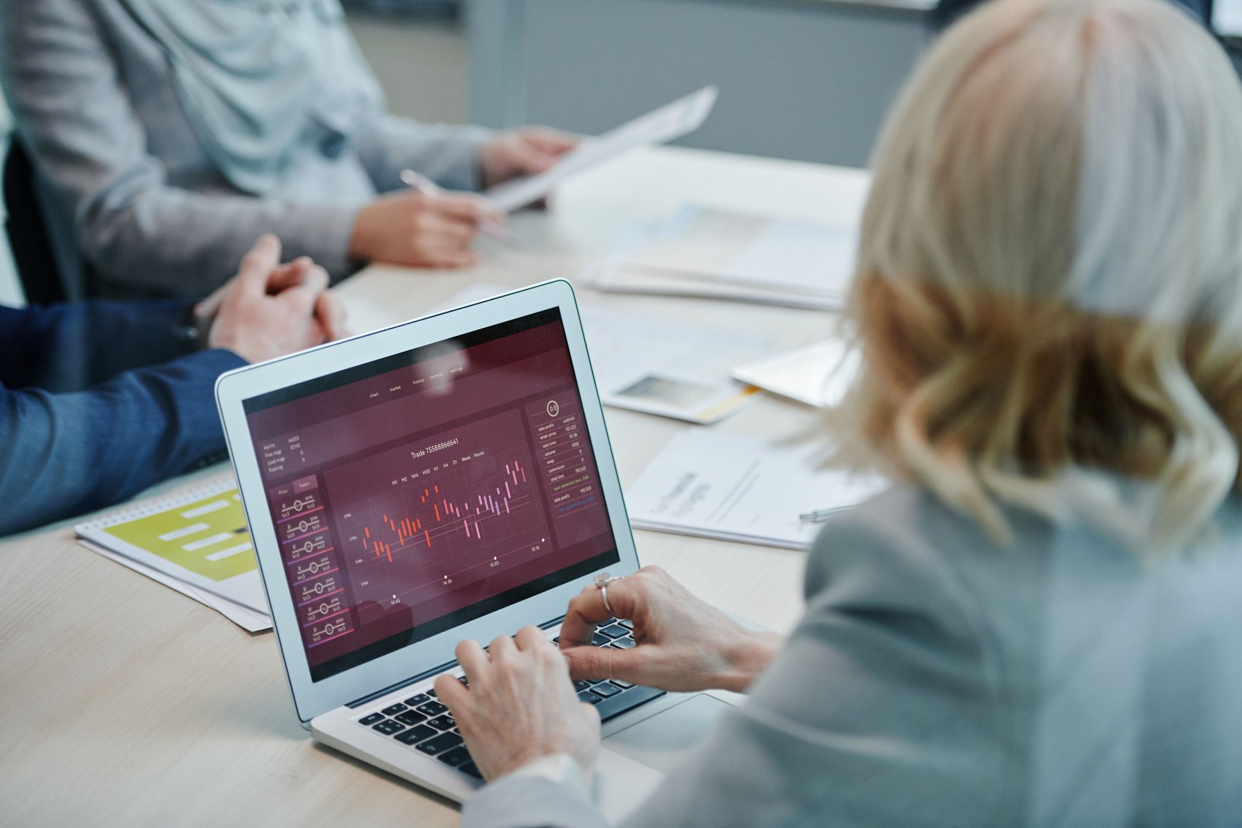 Business team reviewing performance data during a growth strategy discussion